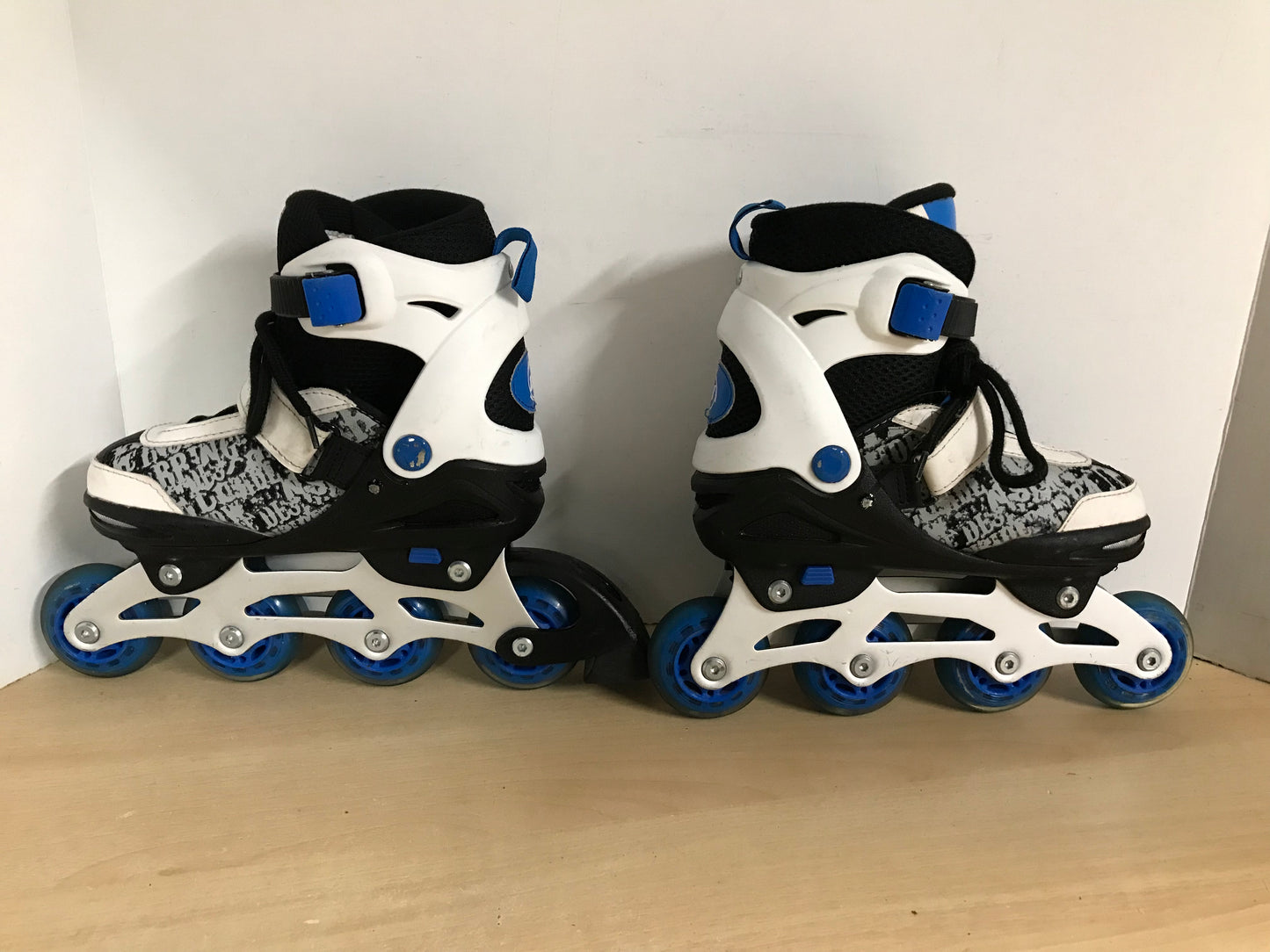Inline Roller Skates Child Size 1-4 Adjustable Ultra Wheels Rubber Wheels Blue White Black