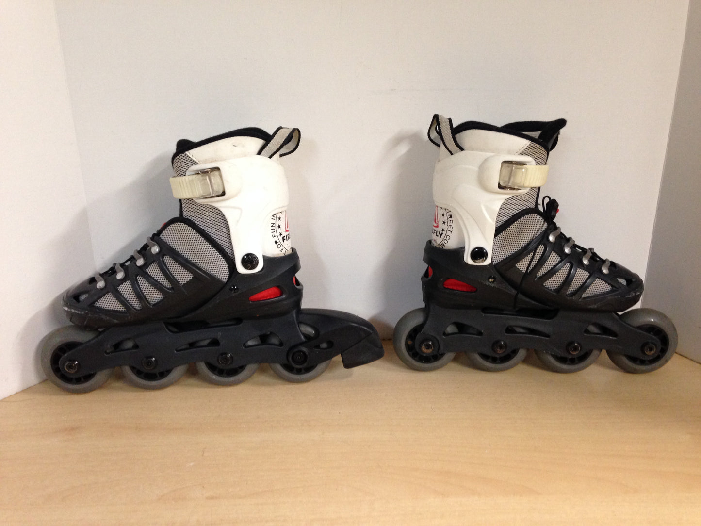 Inline Roller Skates Child Size 11-1 Shoe Size Adjustable Fire Fly Black Red White Rubber Wheels