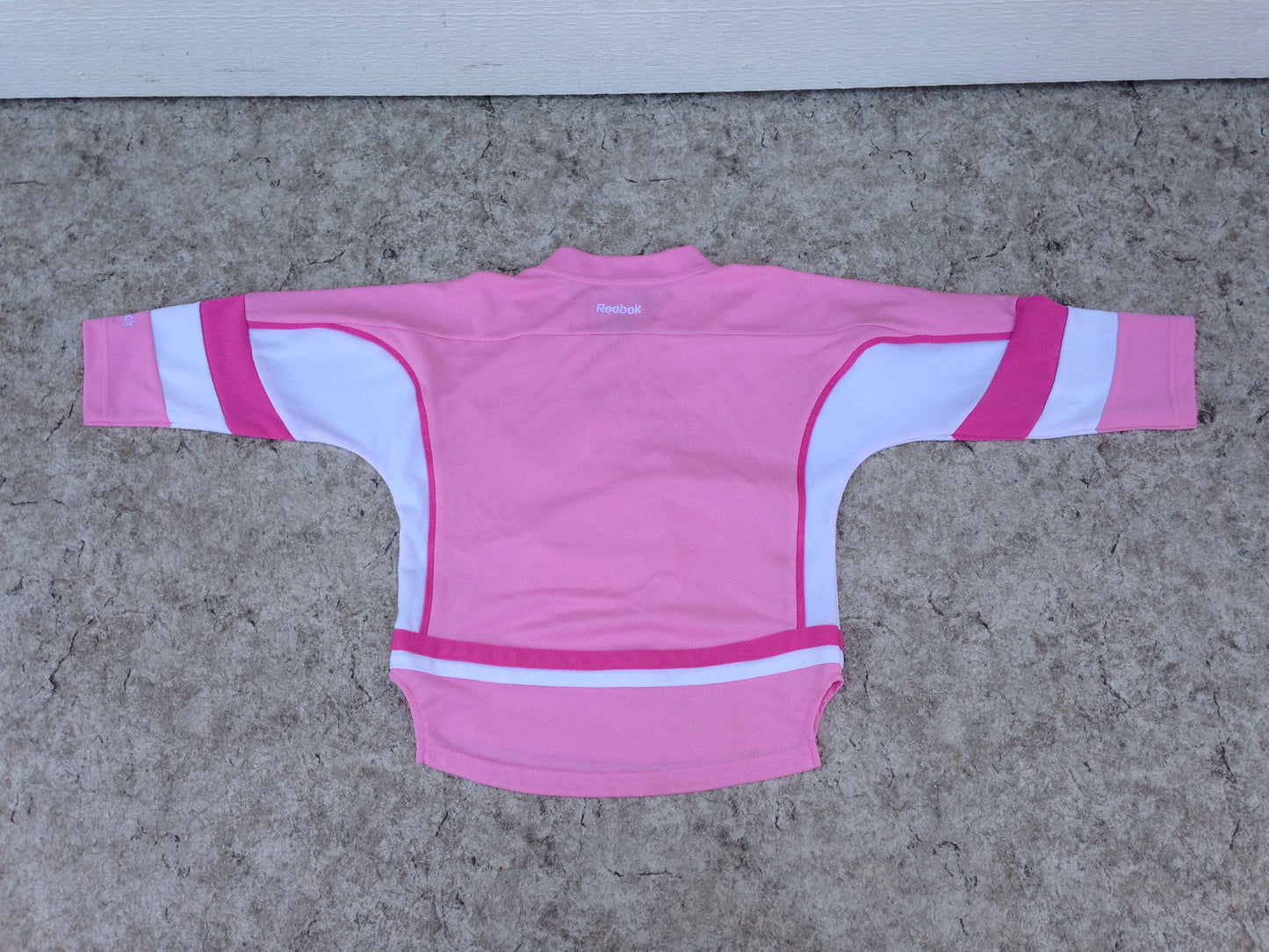 Hockey Jersey Child Size 4 Reebok Vancouver Canucks Pink  New Demo Model