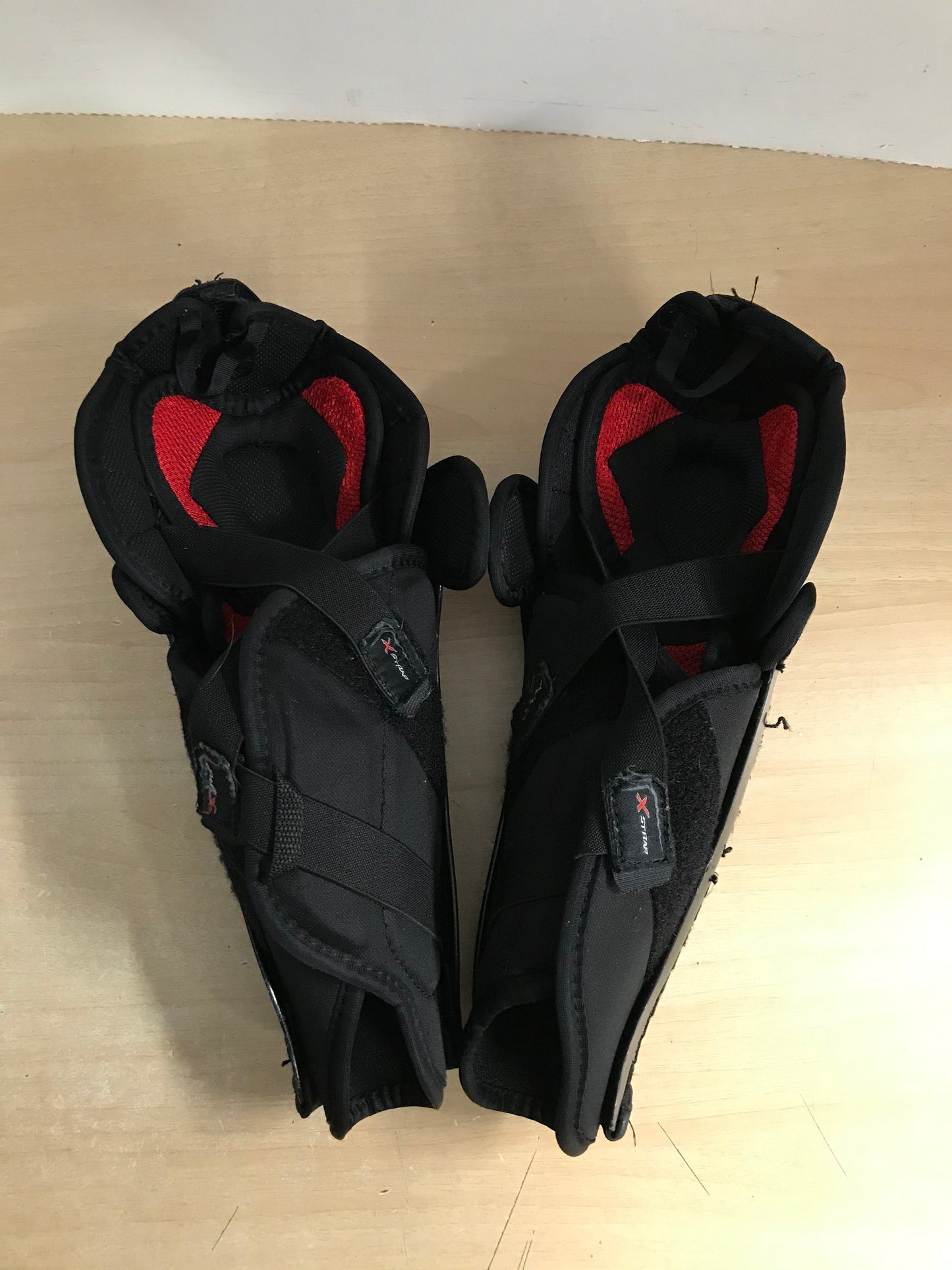 Hockey Shin Pads Child Size 11 inch CCM Slim Black Red Calf Wrap Minor Wear